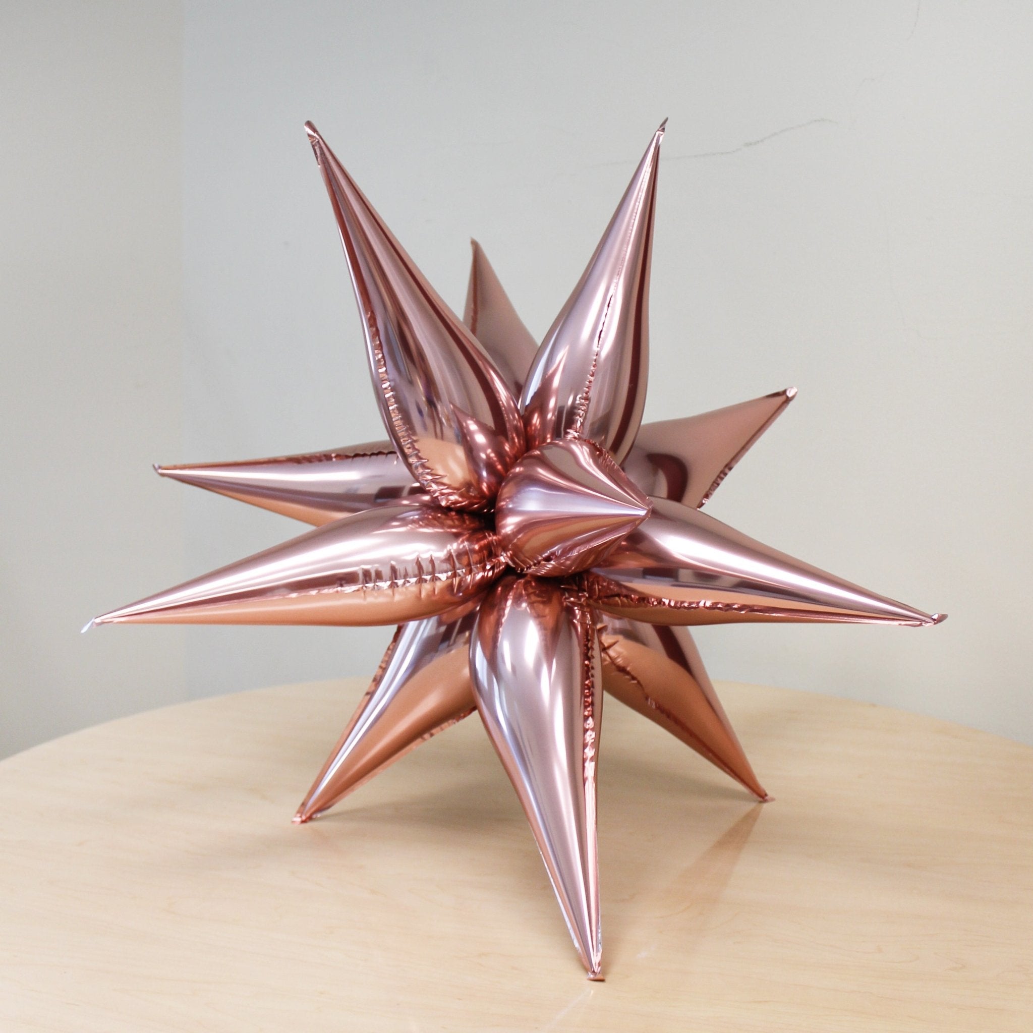 Rose Gold Starburst Balloon